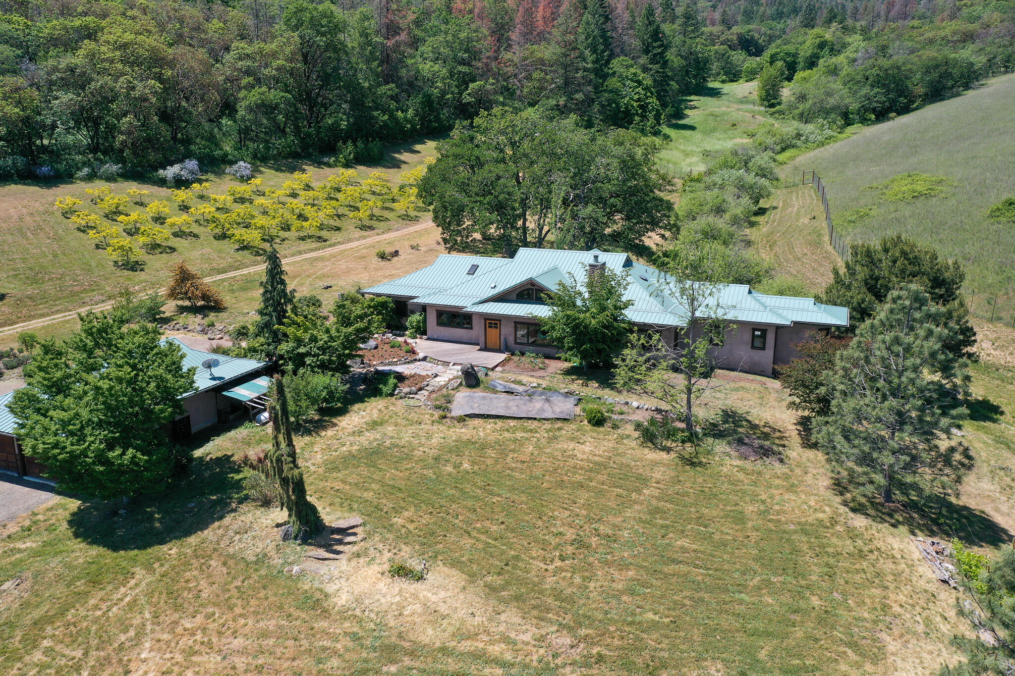 1785 Zemke Road Talent, OR 97540 - Photo 55 of 61 view of a house with yard and sitting area