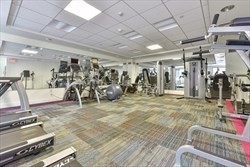 1 Huntington Avenue, Unit 405 Boston, MA 02116 - Photo 8 of 12 a view of a room with gym equipment