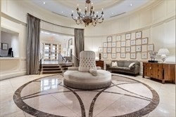 1 Huntington Avenue, Unit 405 Boston, MA 02116 - Photo 9 of 12 a living room with furniture and a chandelier