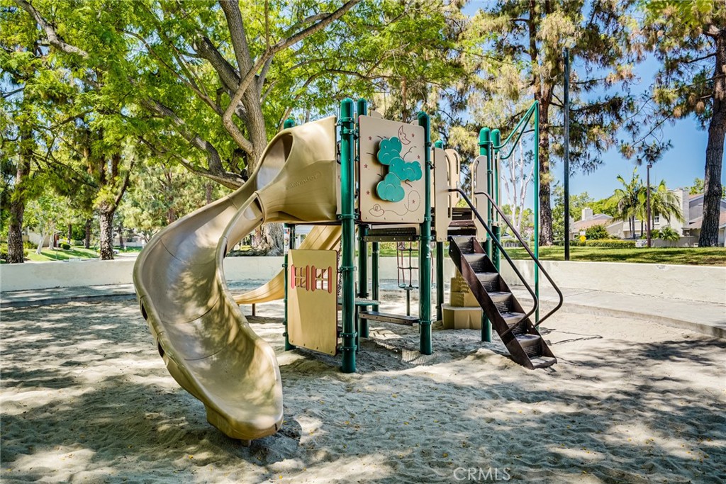 49 East Yale Loop, Unit 26 Irvine, CA 92604 - Photo 59 of 63 a view of outdoor space with garden and entertaining space