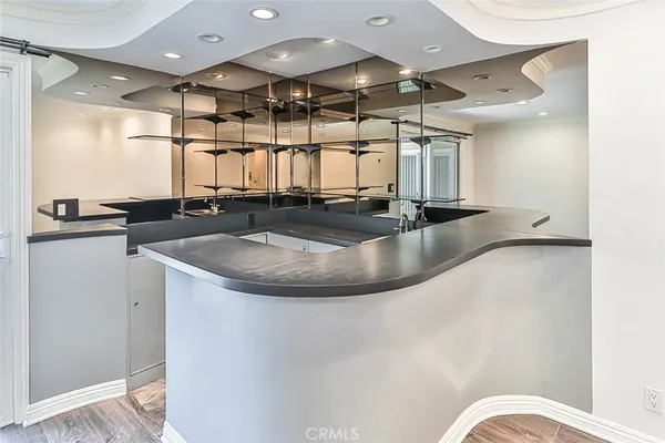 a kitchen with a sink and stove