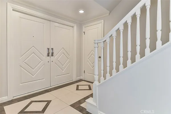 a view of an entryway with staircase