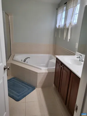 a bathroom with a bathtub sink and toilet