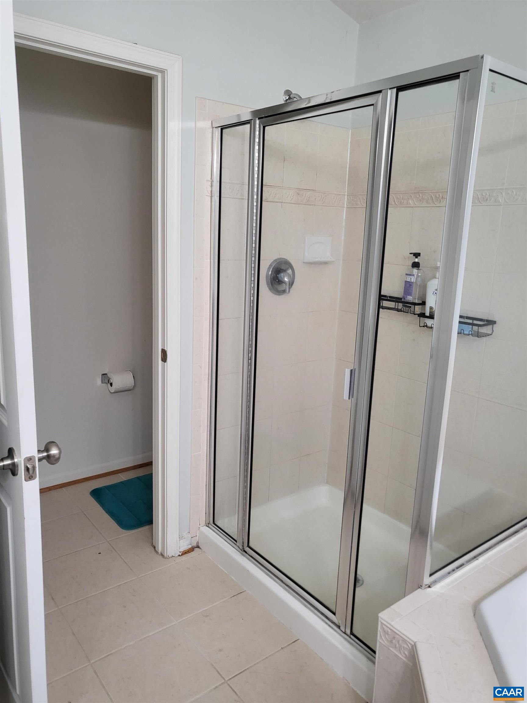 712 Rainier Road Charlottesville, VA 22903 - Photo 7 of 11 a bathroom with a glass door shower
