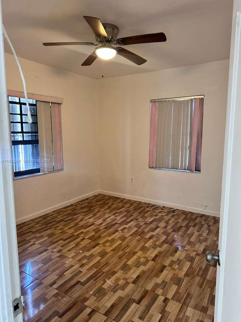 576 Northwest 147th Street, Unit 576 Miami, FL 33168 - Photo 6 of 18 a view of an empty room