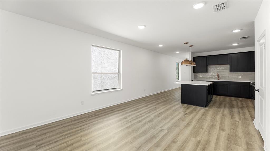 2516 YO Rnch Road Anna, TX 75409 - Photo 10 of 30 a view of kitchen with wooden floor