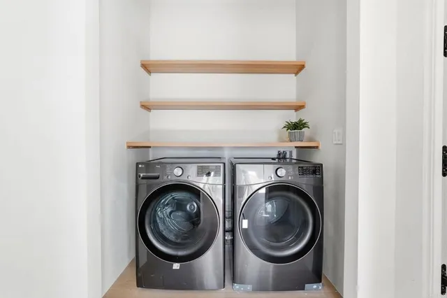 a view of entryway and hall with dining room