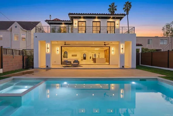 a front view of a house with yard