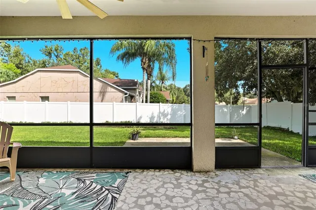 a couple of table and chair with the garden view