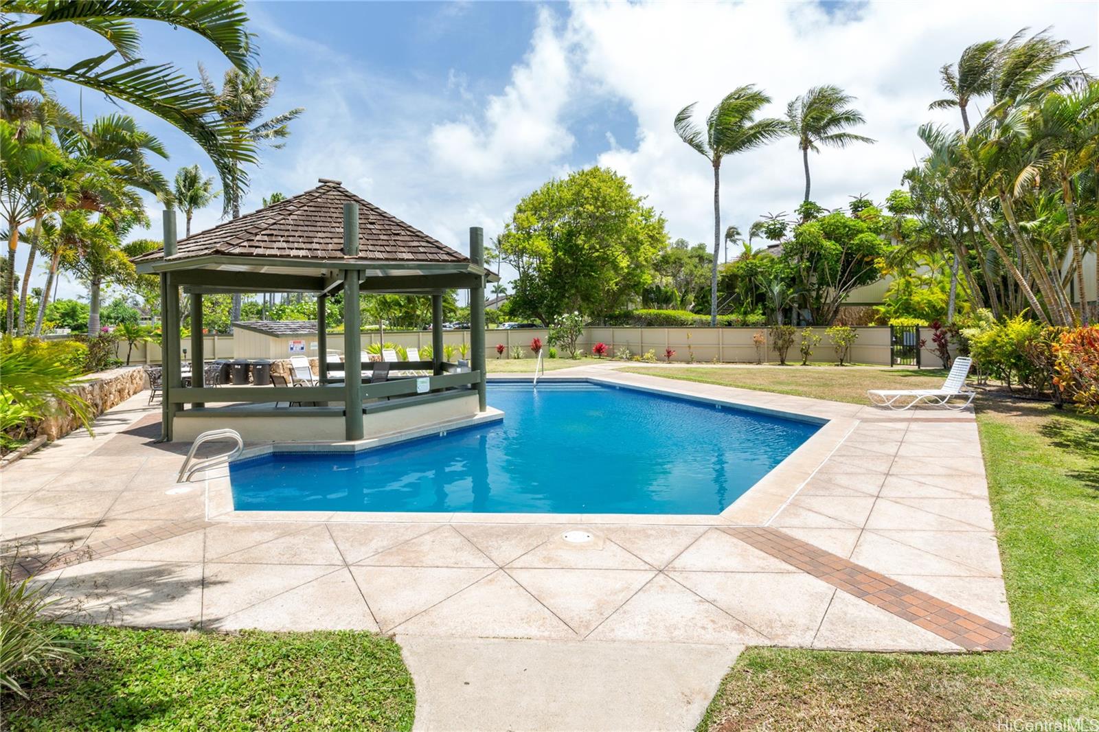 57-101 Kuilima Drive, Unit 132F Kahuku, HI 96731 - Photo 18 of 25 a view of swimming pool with outdoor seating