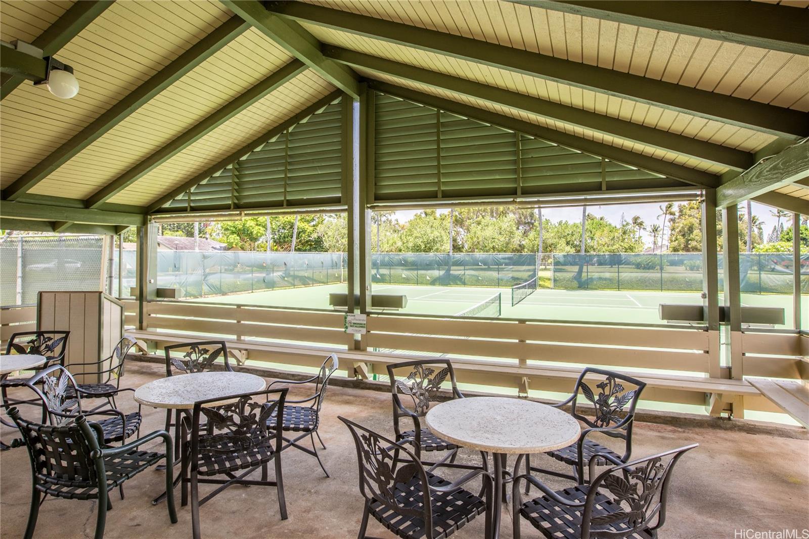57-101 Kuilima Drive, Unit 132F Kahuku, HI 96731 - Photo 22 of 25 a view of a dining room with furniture window and outside view