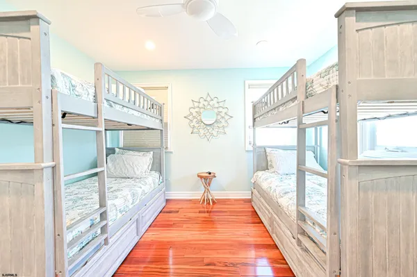 a bed room with a bed and a view of bedroom