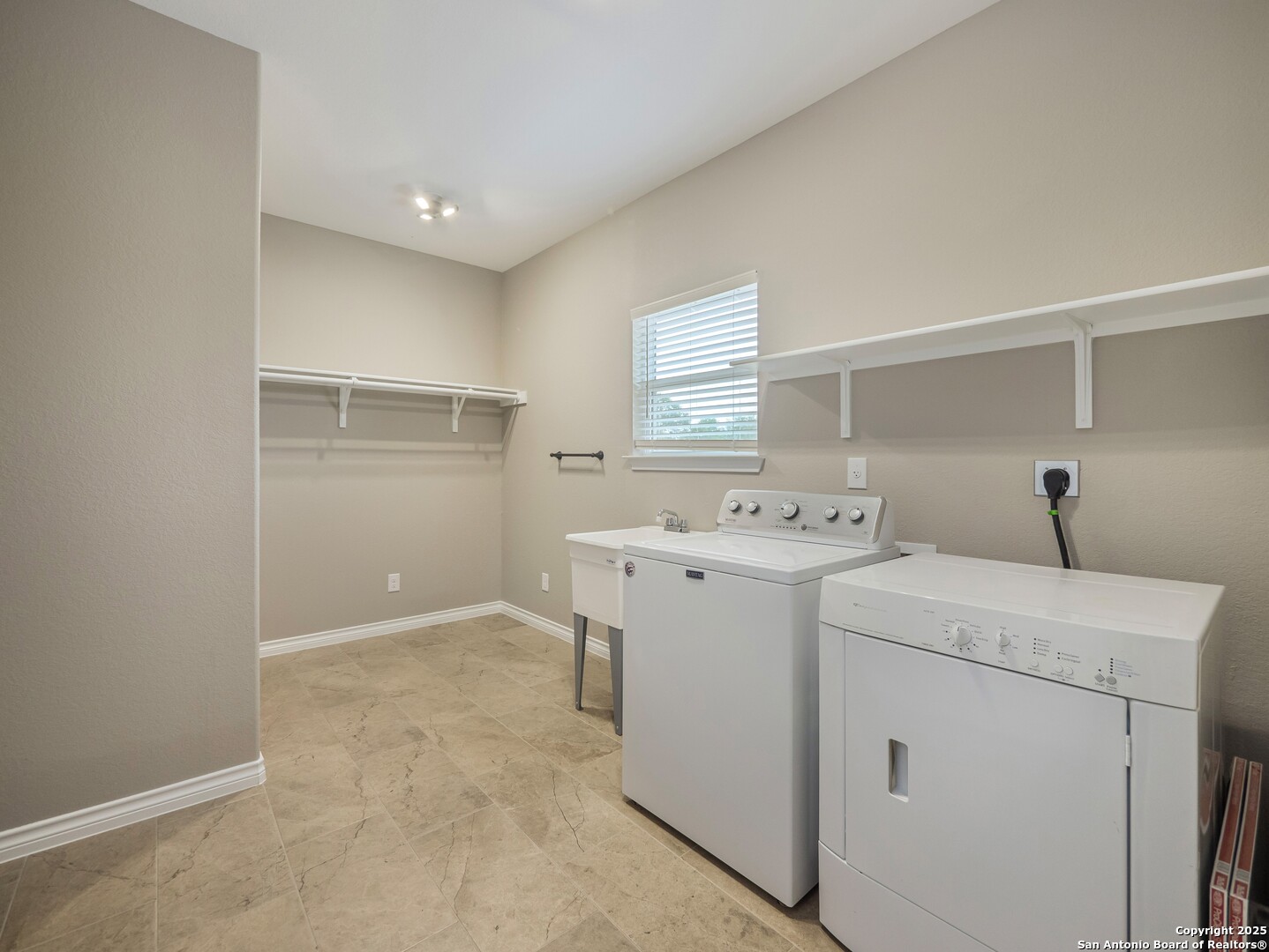 182 Inwood Poteet, TX 78065 - Photo 28 of 45 a view of storage room
