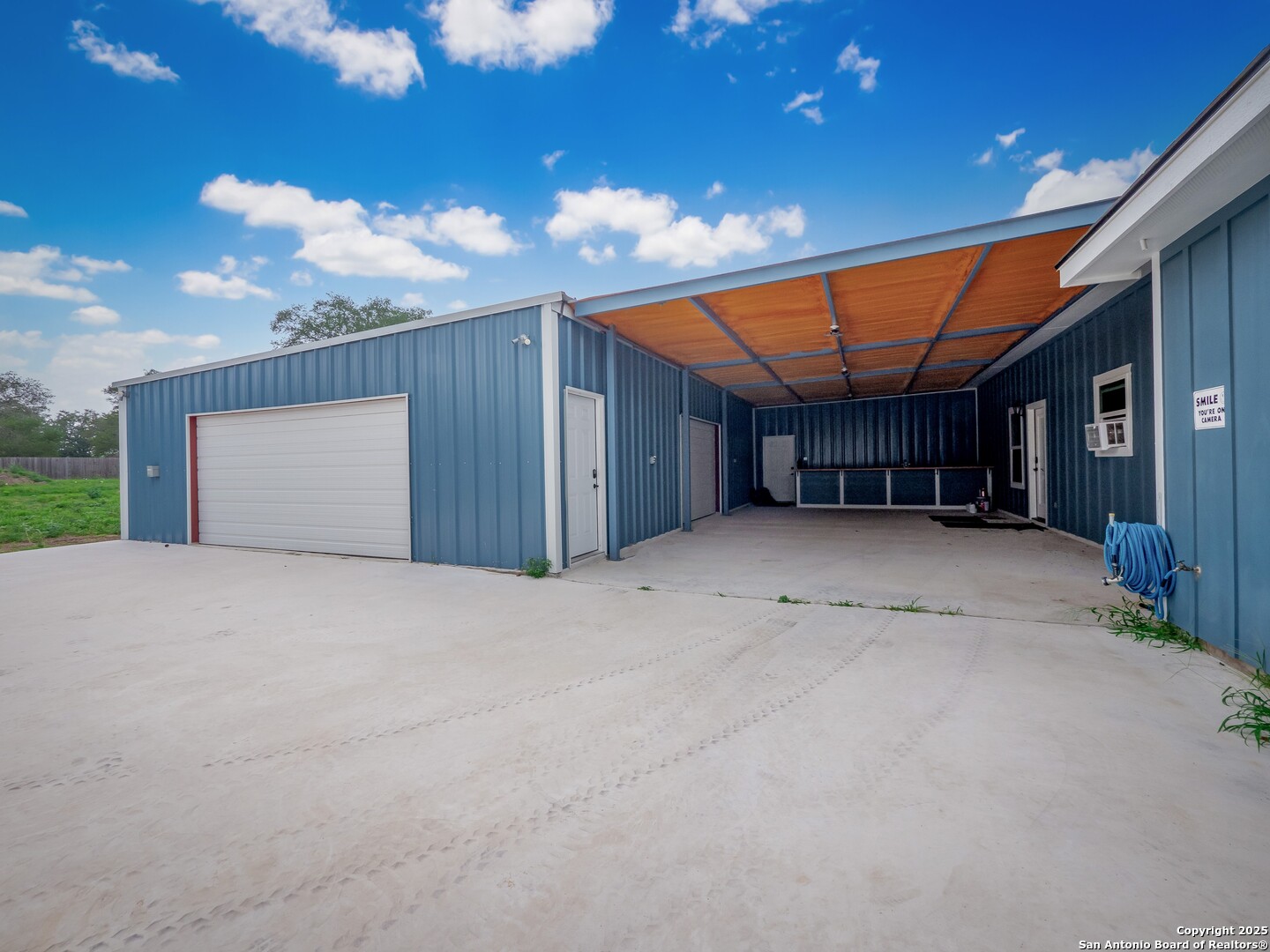 182 Inwood Poteet, TX 78065 - Photo 38 of 45 a view of a room with a garage