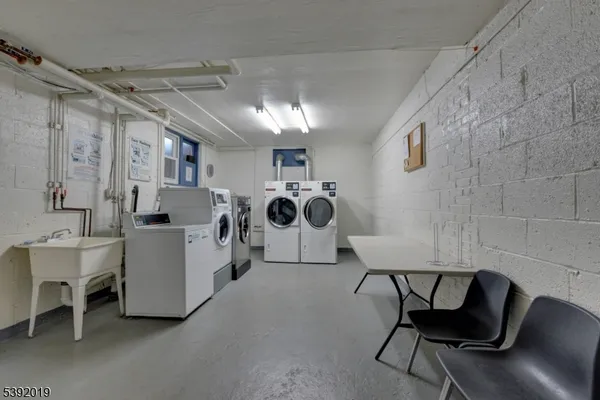 a view of a chairs and a table in a room