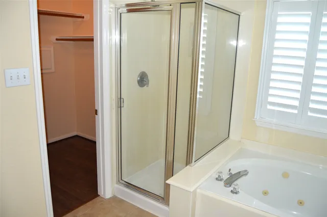 a bathroom with a sink a toilet and a bathtub