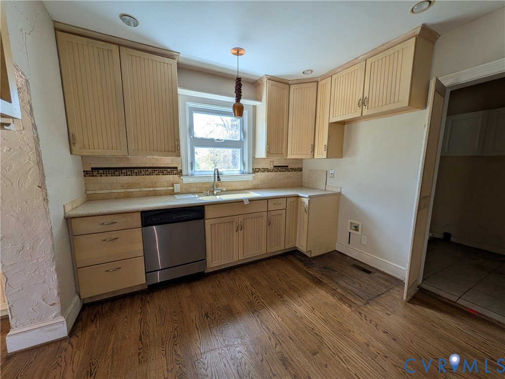 12307 Buckingham Street Chester, VA 23831 - Photo 12 of 40 a kitchen with a sink window and cabinets