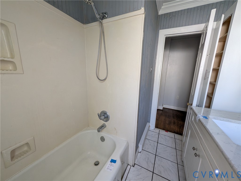 12307 Buckingham Street Chester, VA 23831 - Photo 24 of 40 a bathroom with a bathtub