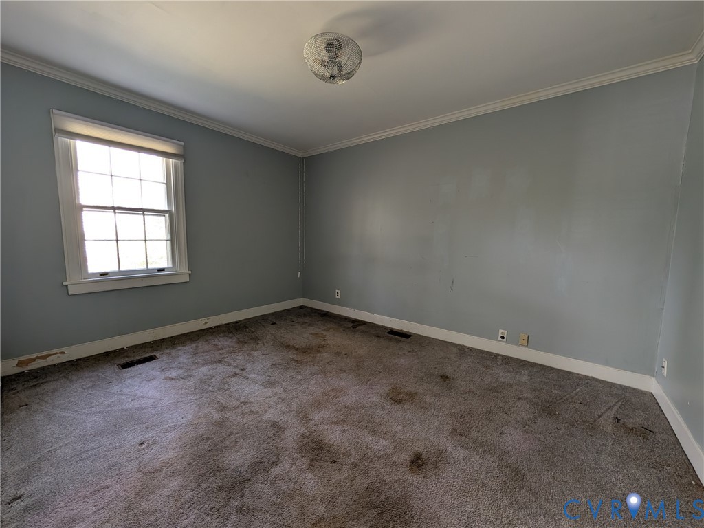 12307 Buckingham Street Chester, VA 23831 - Photo 25 of 40 an empty room with a window