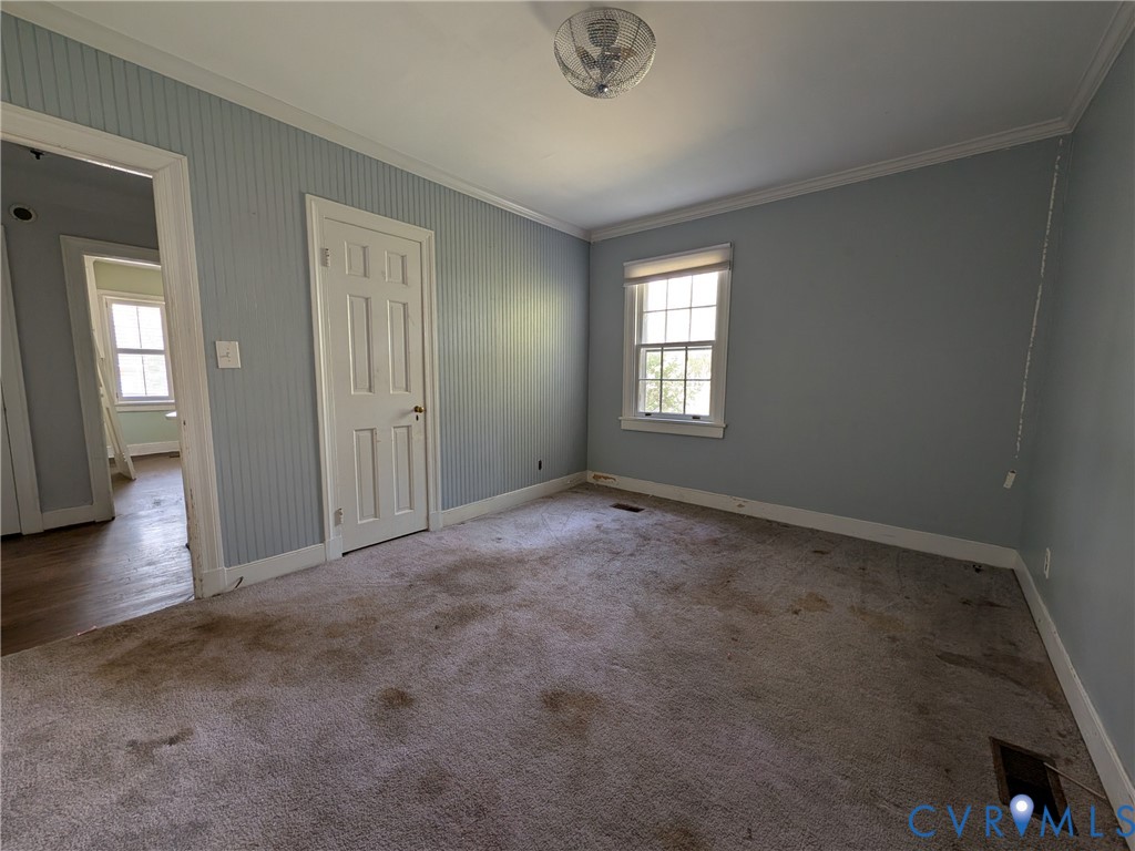 12307 Buckingham Street Chester, VA 23831 - Photo 26 of 40 an empty room with windows