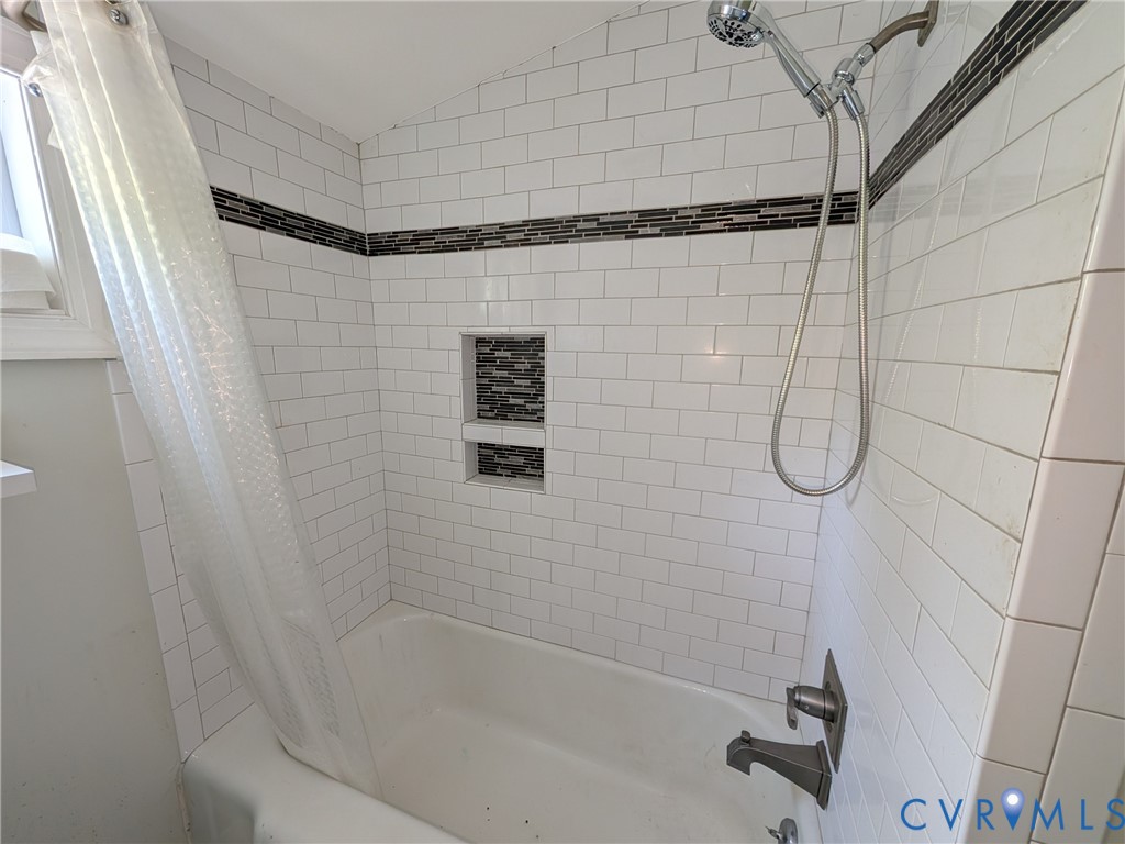 12307 Buckingham Street Chester, VA 23831 - Photo 31 of 40 a bathroom with a shower