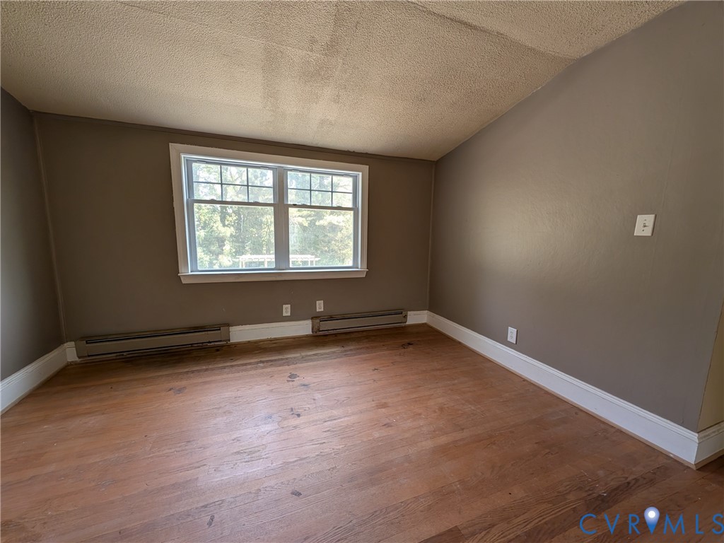 12307 Buckingham Street Chester, VA 23831 - Photo 32 of 40 an empty room with a window