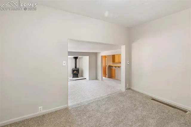 a view of a room with an empty space