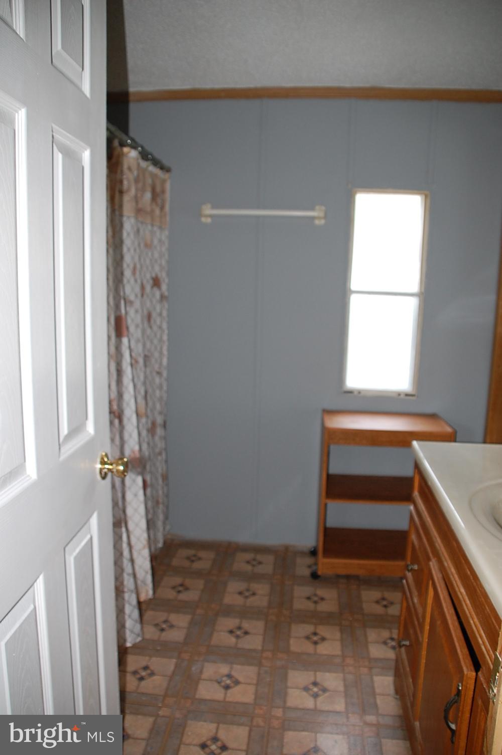 10505 Cedarville Road Brandywine, MD 20613 - Photo 15 of 28 View into Full Bathroom