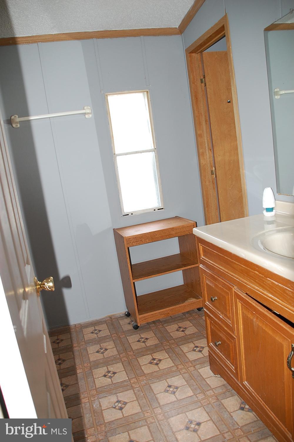 10505 Cedarville Road Brandywine, MD 20613 - Photo 16 of 28 Full Bathroom showing door to Primary BR