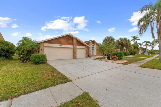 a view of garage yard and tree