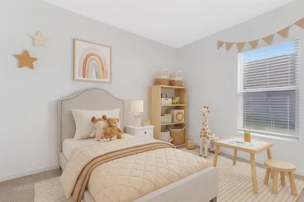 a bedroom with a bed and a table