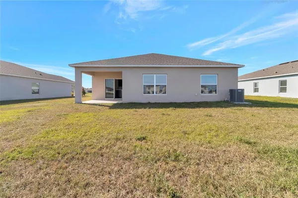 a house view with a outdoor space