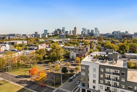 a view of a city that has tall buildings