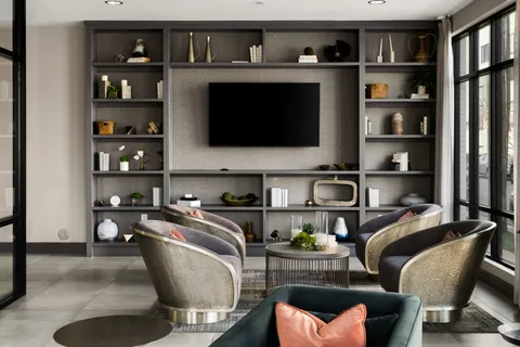 a living room with furniture and a window