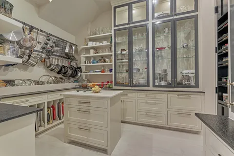 a view of cabinets and window