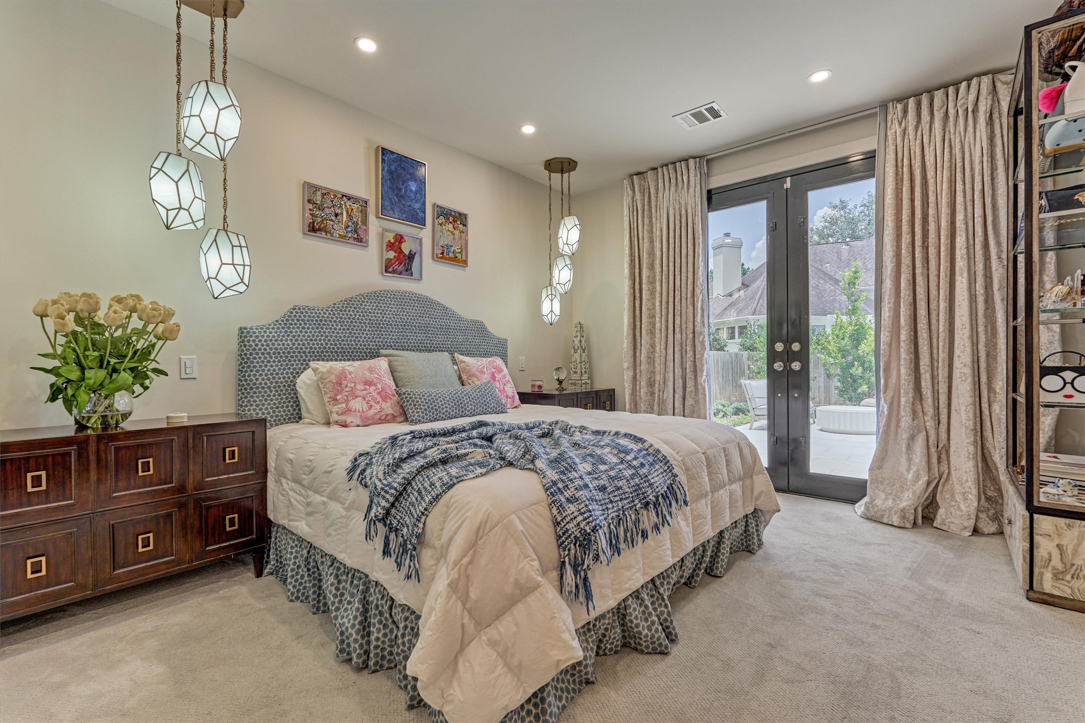 15 Atrium Woods Court The Woodlands, TX 77381 - Photo 20 of 50 a bedroom with a bed and a window
