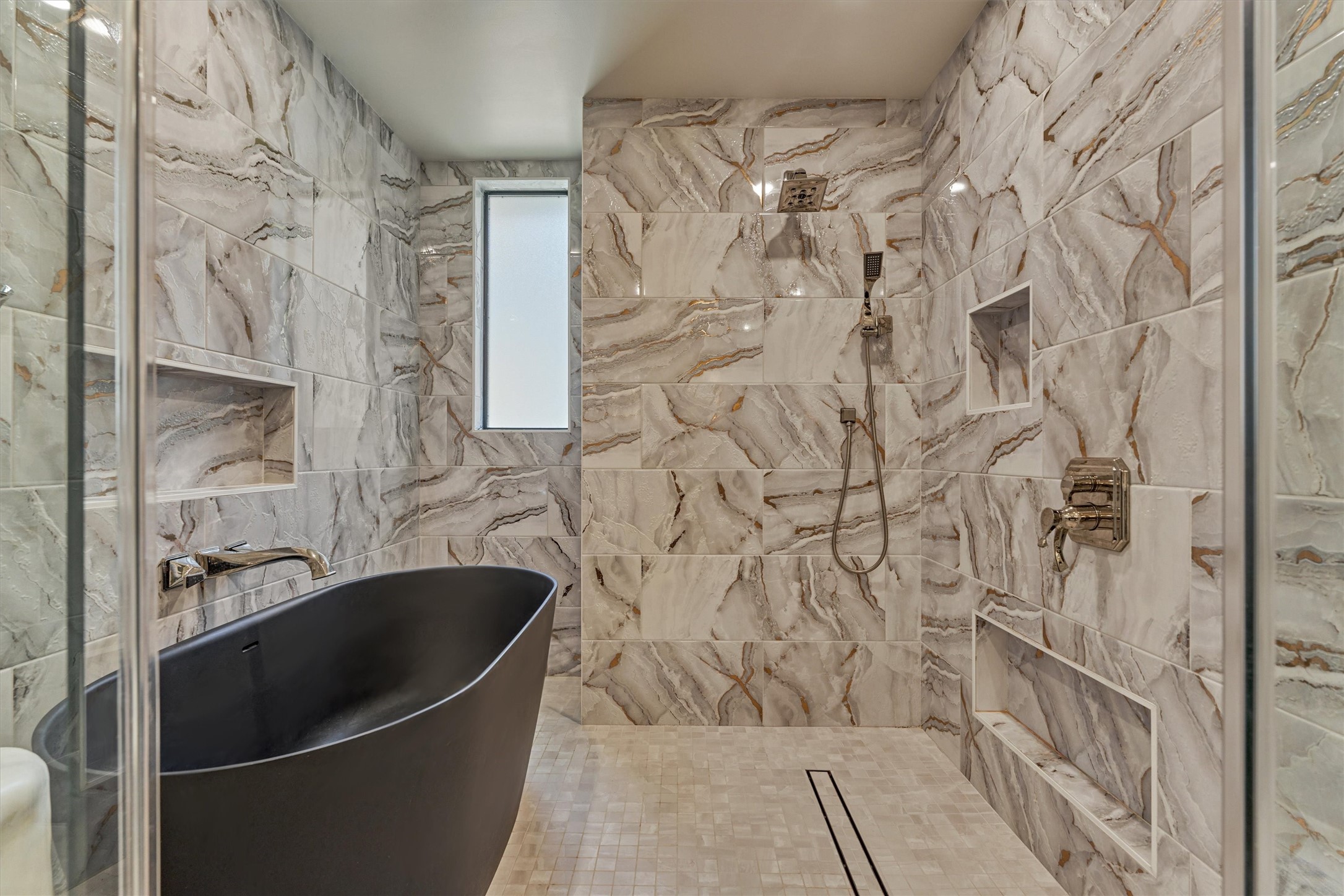 15 Atrium Woods Court The Woodlands, TX 77381 - Photo 23 of 50 a bathroom with shower