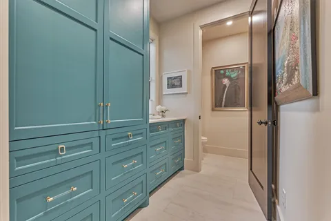 a bathroom with a shower sink and mirror