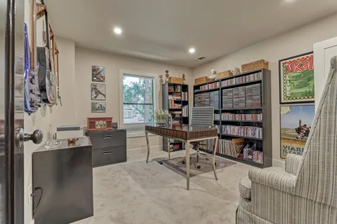 a view of a workspace with furniture