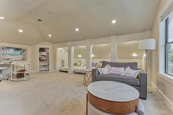 a room with furniture and window