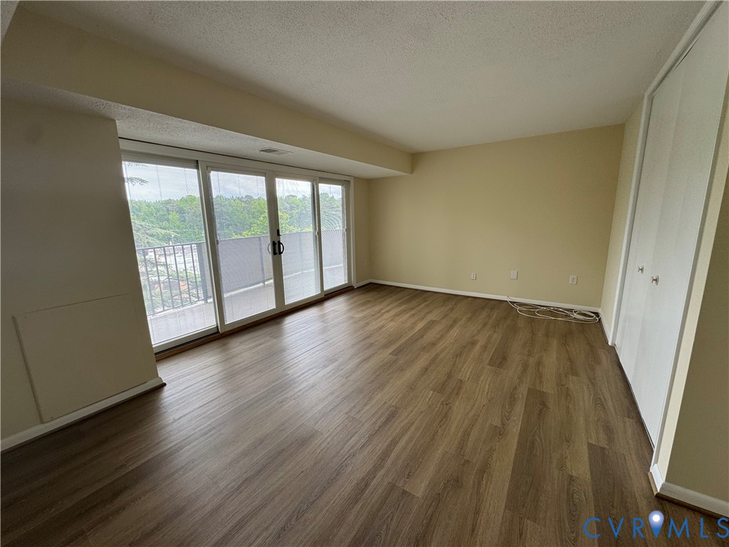 2956 Hathaway Road, Unit U404 Richmond, VA 23225 - Photo 14 of 24 Second Bedroom with sliding doors to private balco
