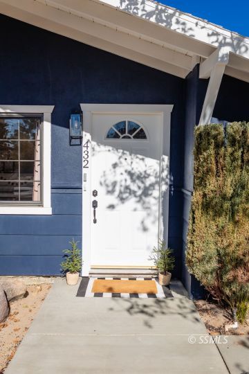 432 West Howell Avenue Ridgecrest, CA 93555 - Photo 2 of 28 a front view of a house with a garage
