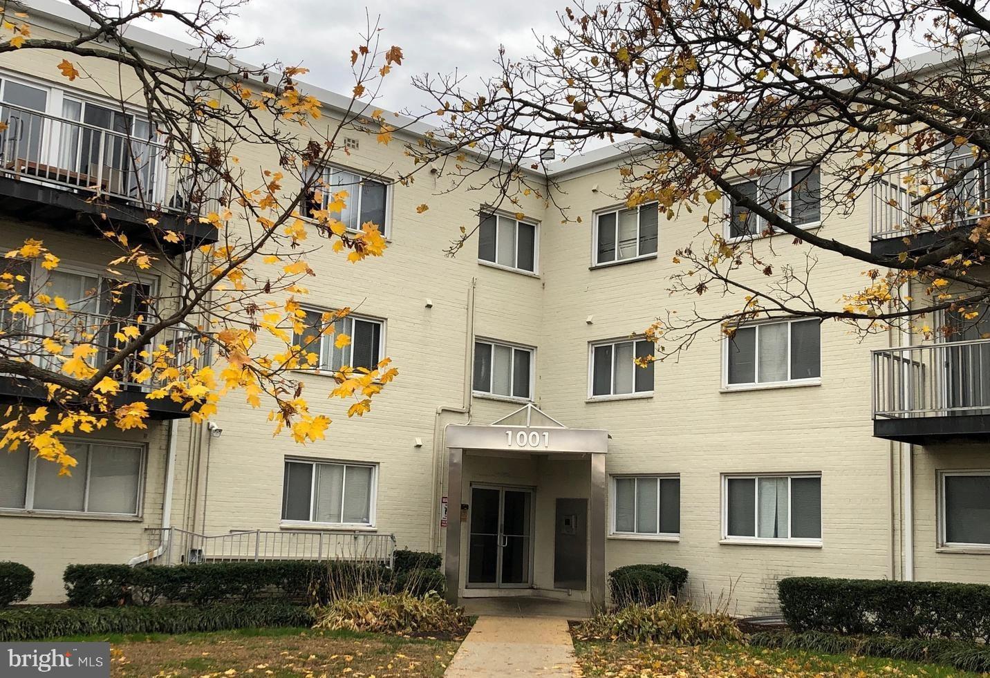 Charming apartment building with autumn hues.