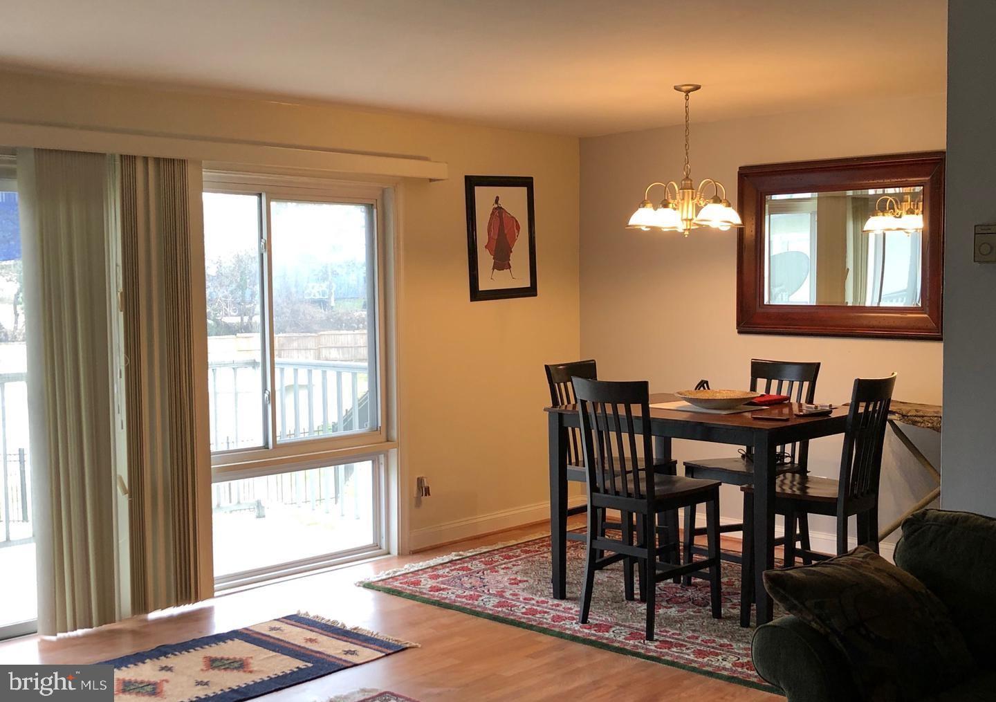 1001 Chillum Road, Unit 312 Hyattsville, MD 20782 - Photo 2 of 11 Bright dining area with scenic views.