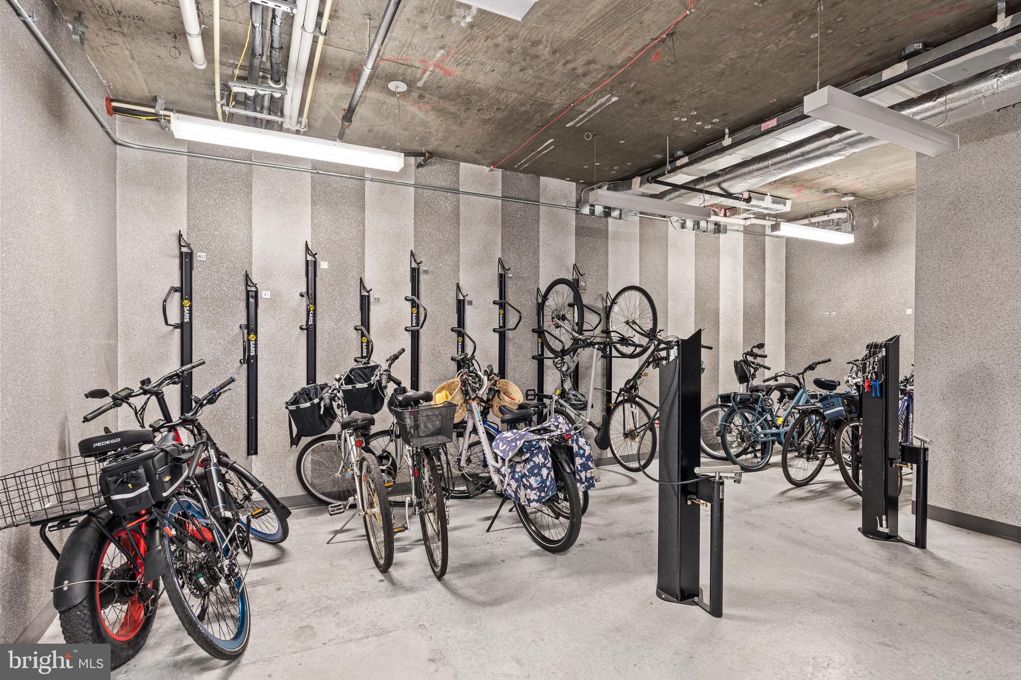 310 Strand Street, Unit 204 Alexandria, VA 22314 - Photo 11 of 11 a view of a room with bicycles