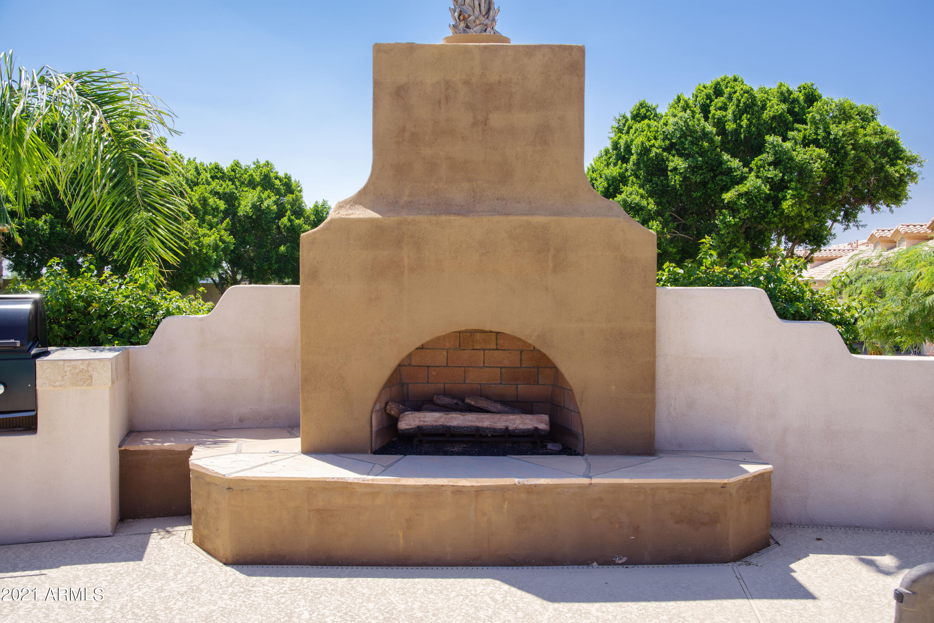 5830 East McKellips Road, Unit 40 Mesa, AZ 85215 - Photo 31 of 41 Fireplace at Community Pool