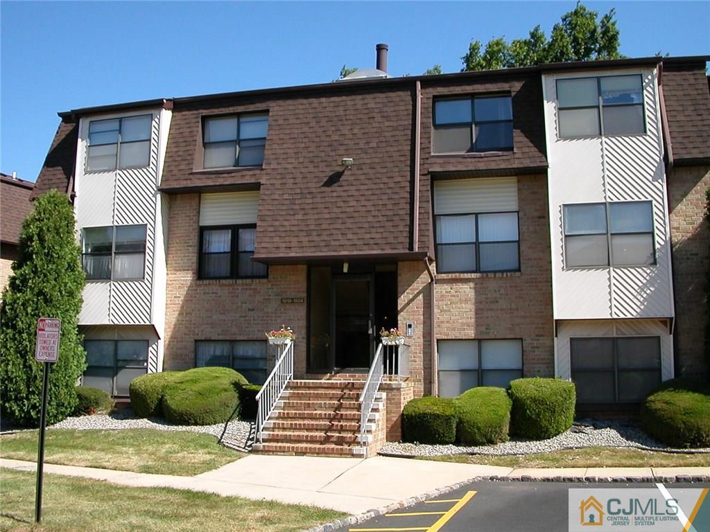 1920 Raspberry Court, Unit 1920 Edison, NJ 08817 - Photo 1 of 12 a front view of a house with garden