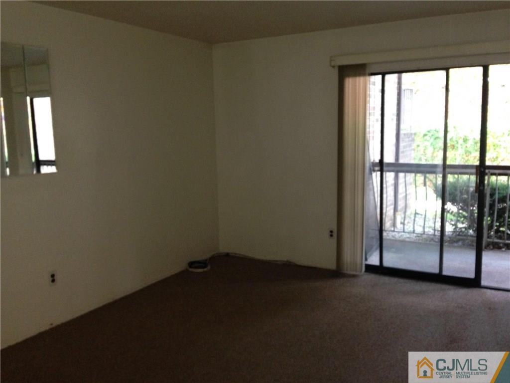 1920 Raspberry Court, Unit 1920 Edison, NJ 08817 - Photo 2 of 12 a view of room with floor to ceiling windows