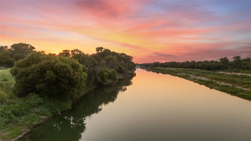 Tbd Horseshoe Bend Road Waco, TX 76708 - Photo 13 of 23 a view of a lake with houses in the back