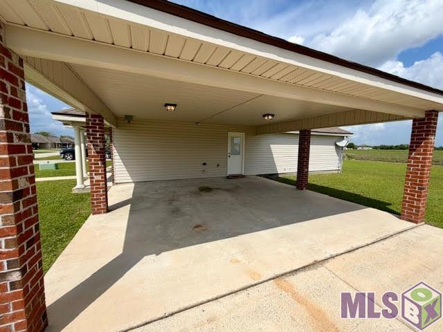 199 Landmark Drive Raceland, LA 70394 - Photo 17 of 19 Carport